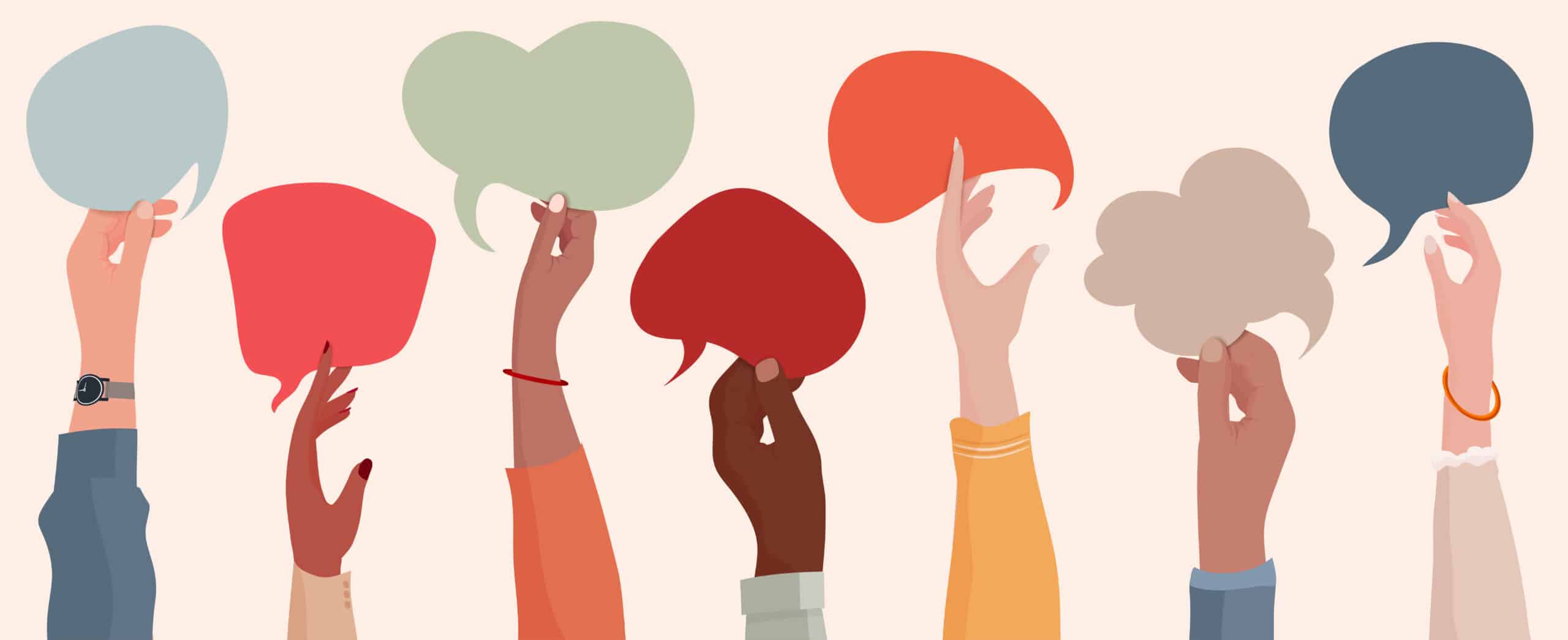 Symbolizes cultural differences in the workplace through diverse hands in the air holding speech balloons